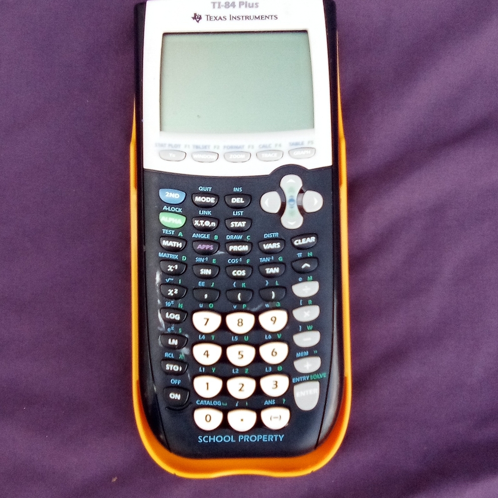 Texas Instruments Graphing Calculator in Black with Orange Trim